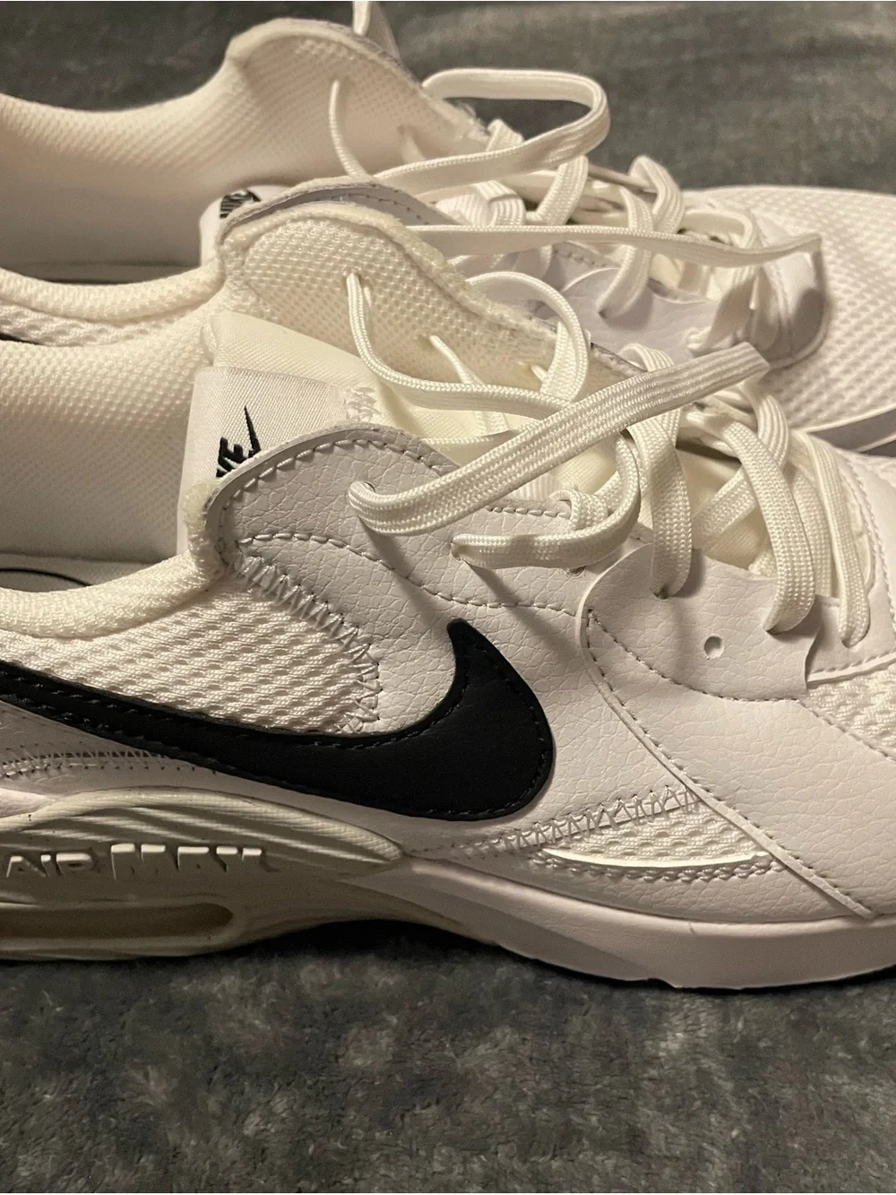 Nike White Sneakers with Black Swoosh